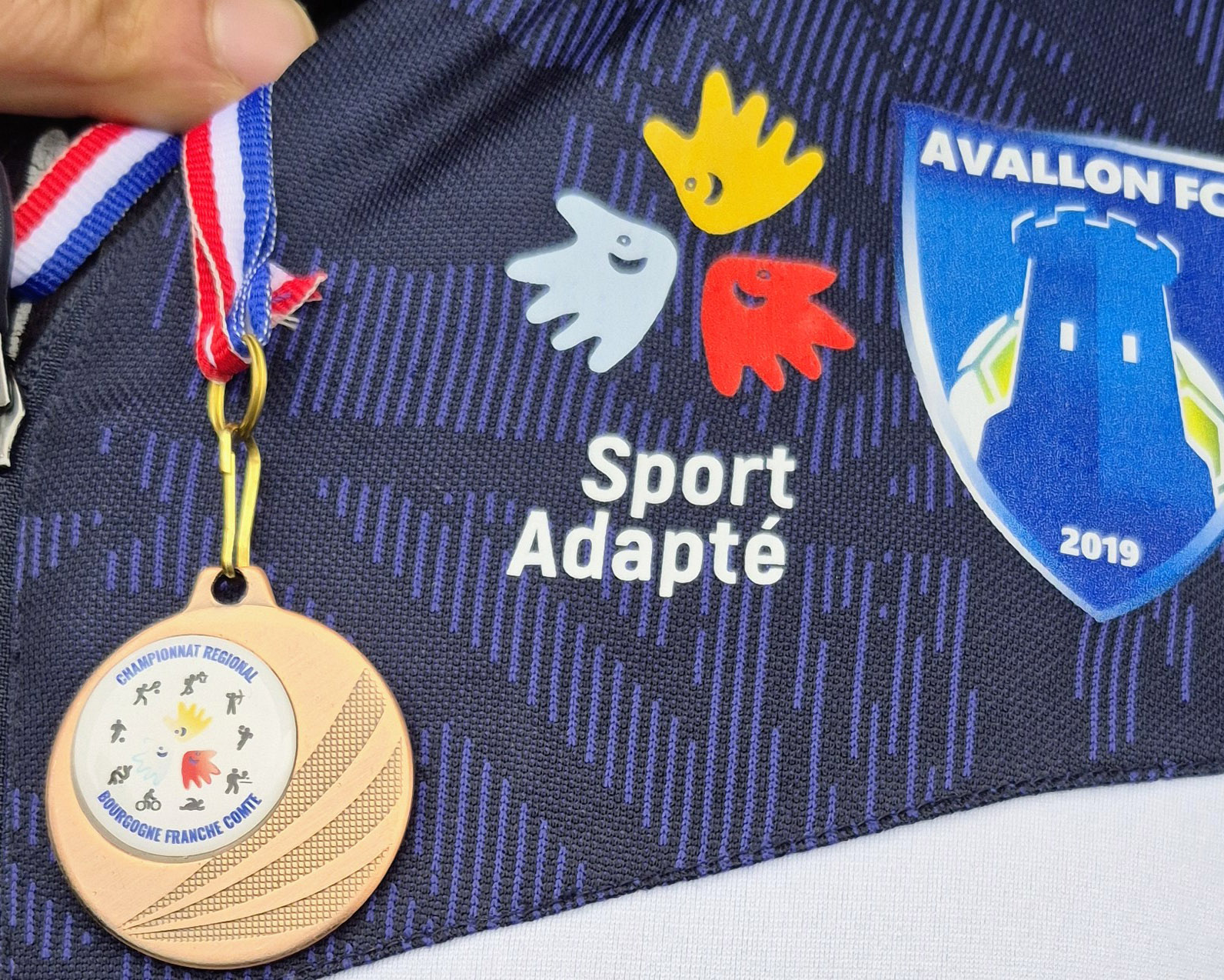 La médaille de bronze régionale sur le maillot Sport Adapté de l’AFCO